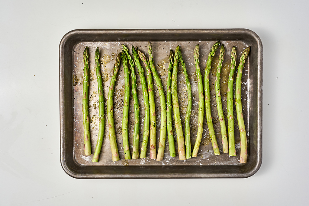 Asparagus on a baking sheet