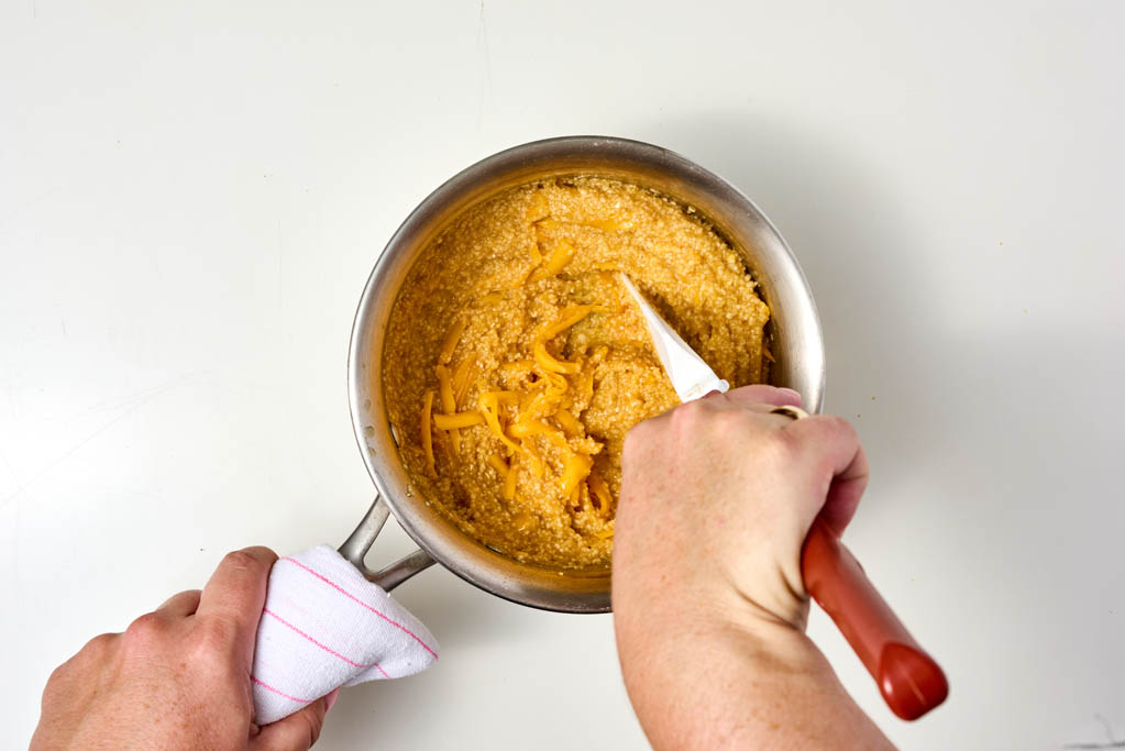 Mixing grits with cheese