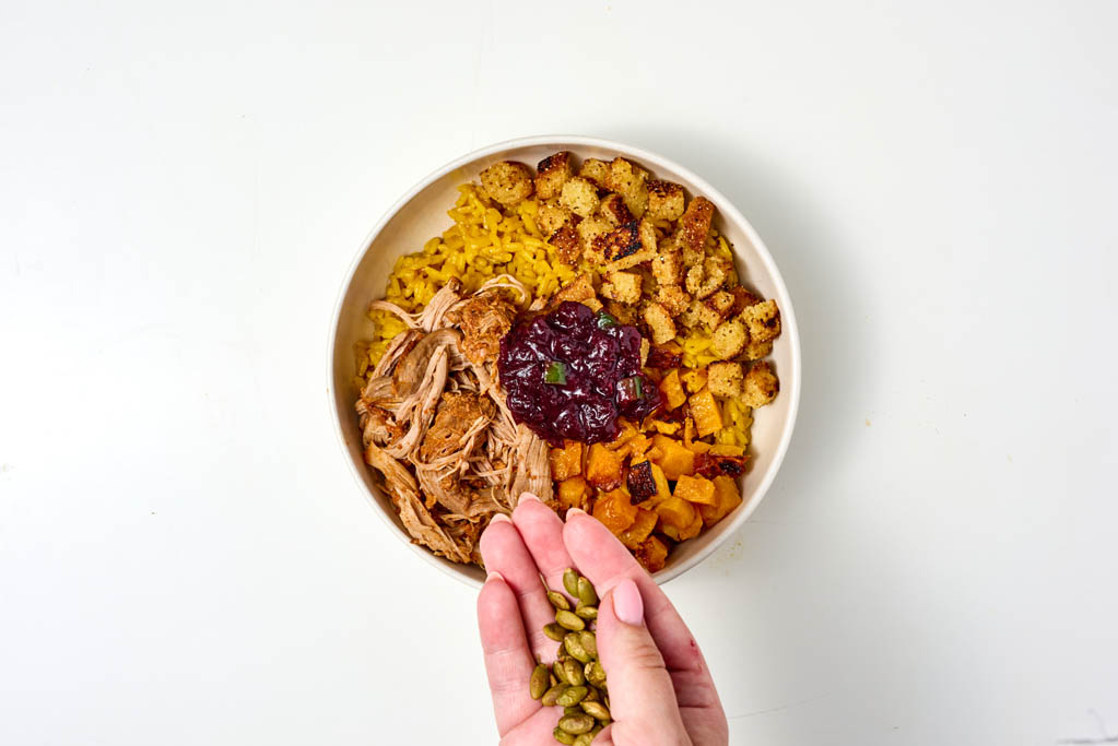 Layering ingredients into a bowl