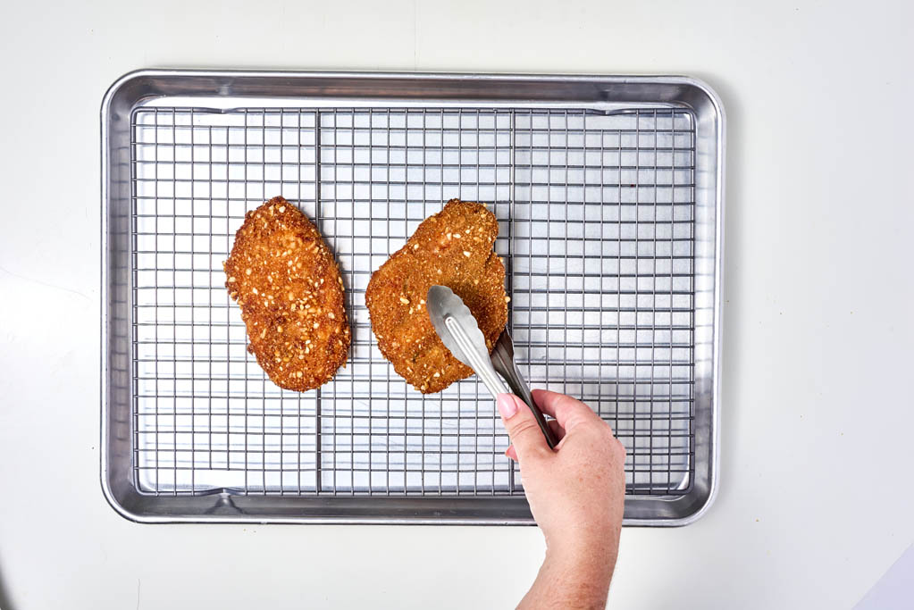 Placing chicken on a wire rack