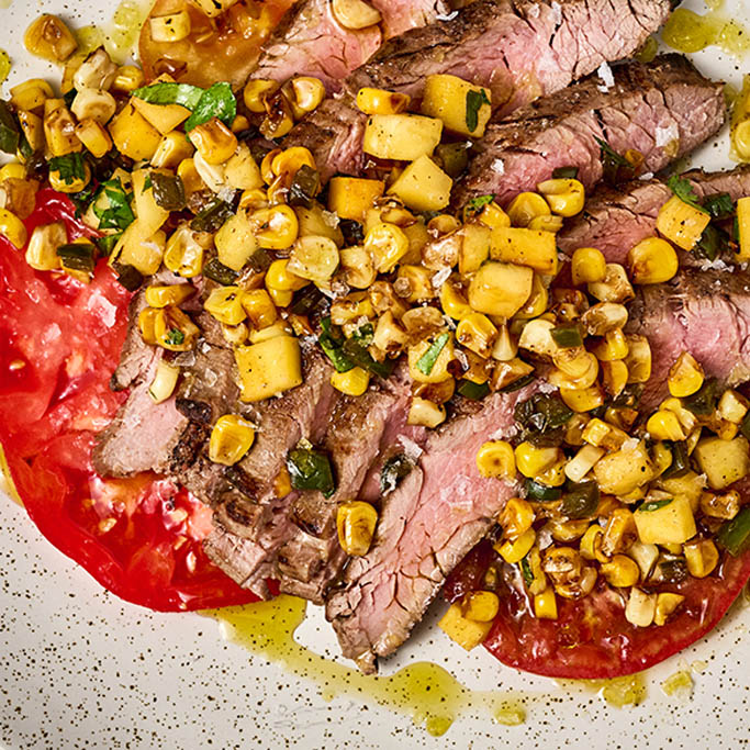 Flank Steak with Heirloom Tomatoes and Corn and Mango Relish