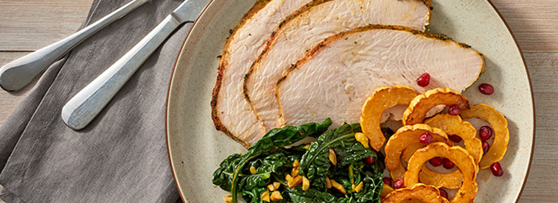 Jennie-O Turkey plate with sliced turkey, delicata squash and greens